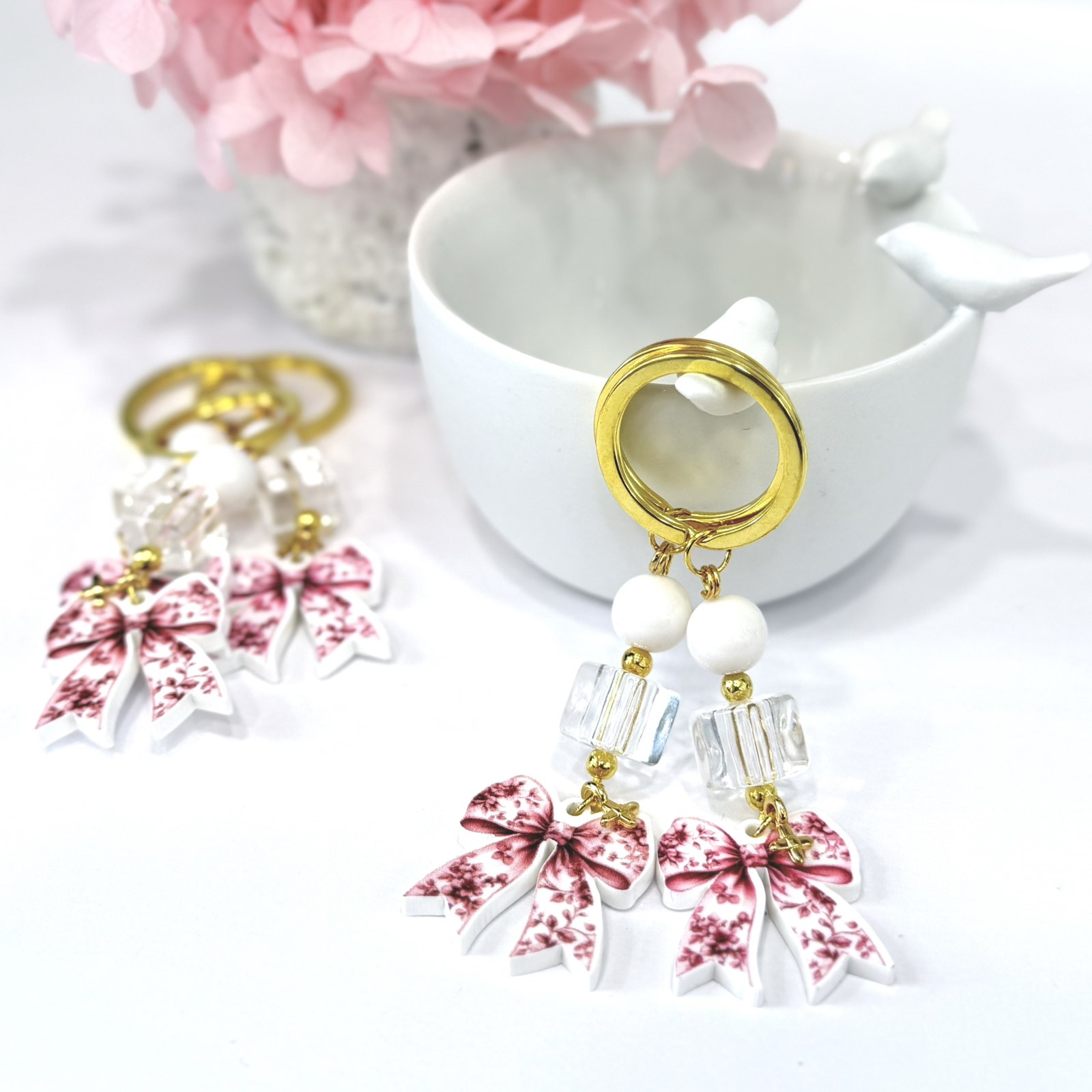 GP.91 Μπρελόκ με πλέξι φιόγκο τύπου Dior και σταυρό 24Κ.